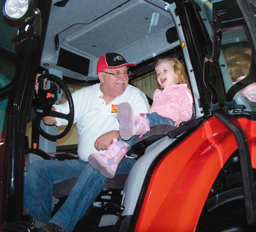 Former publisher John Beischer and grand daughter Lily Watkins